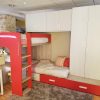 Dormitorio juvenil con litera, nido, armario y mesa de estudio - Image 6